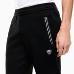 Pantaloni slim fit in jersey con logo in metallo 8NPP63 PJ4EZ 1200 EA7 Black 