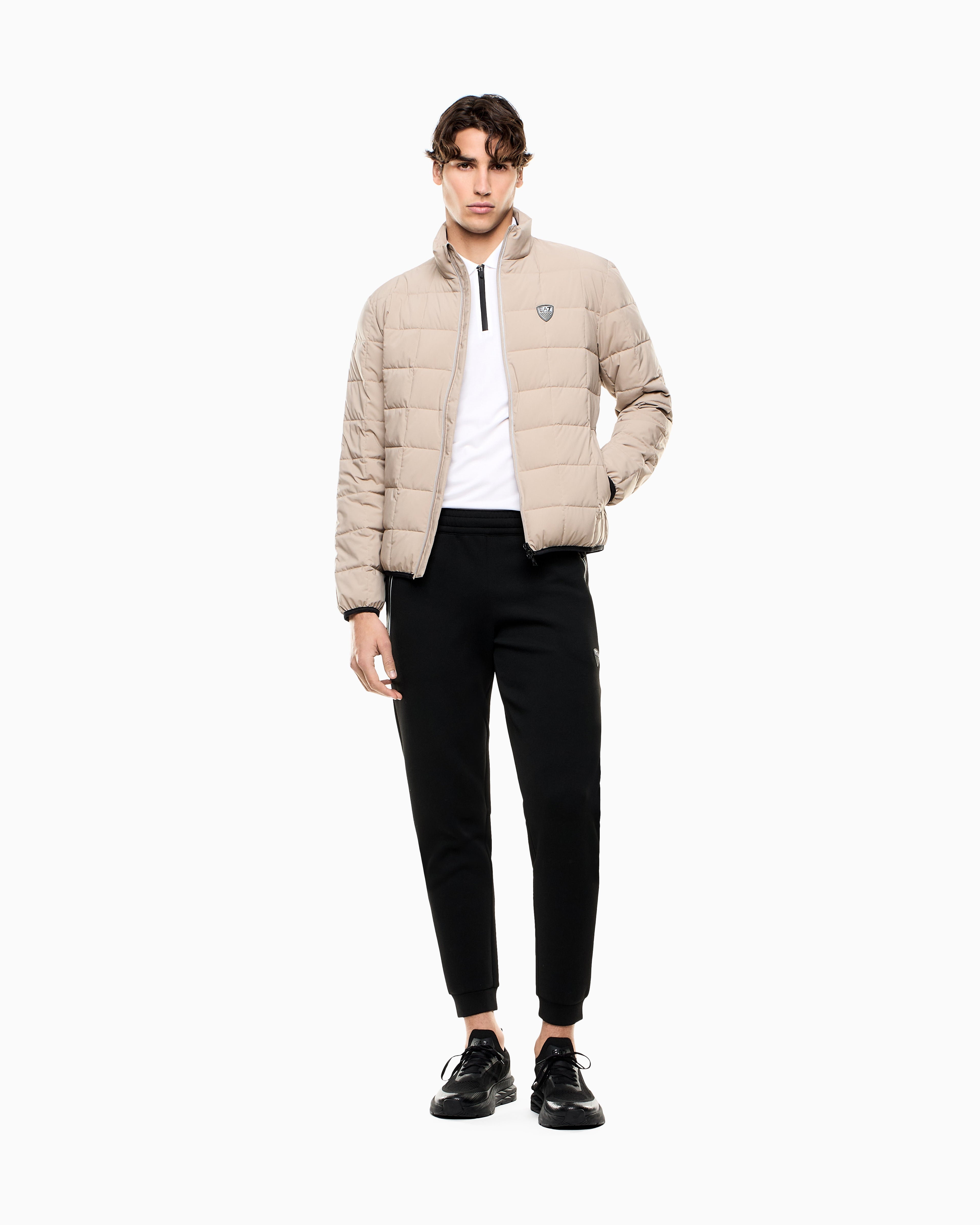 Pantaloni slim fit in jersey con logo in metallo 8NPP63 PJ4EZ 1200 EA7 Black 