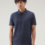 Polo Mackinack tinta in capo in piqué di cotone elasticizzato CFWOPO0065MRUT1483 3989 WOOLRICH Melton blue 