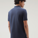 Polo Mackinack tinta in capo in piqué di cotone elasticizzato CFWOPO0065MRUT1483 3989 WOOLRICH Melton blue 