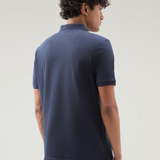 Polo Mackinack tinta in capo in piqué di cotone elasticizzato CFWOPO0065MRUT1483 3989 WOOLRICH Melton blue 
