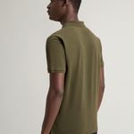 Polo Mackinack tinta in capo in piqué di cotone elasticizzato CFWOPO0065MRUT1483 6006 WOOLRICH Greenstone 