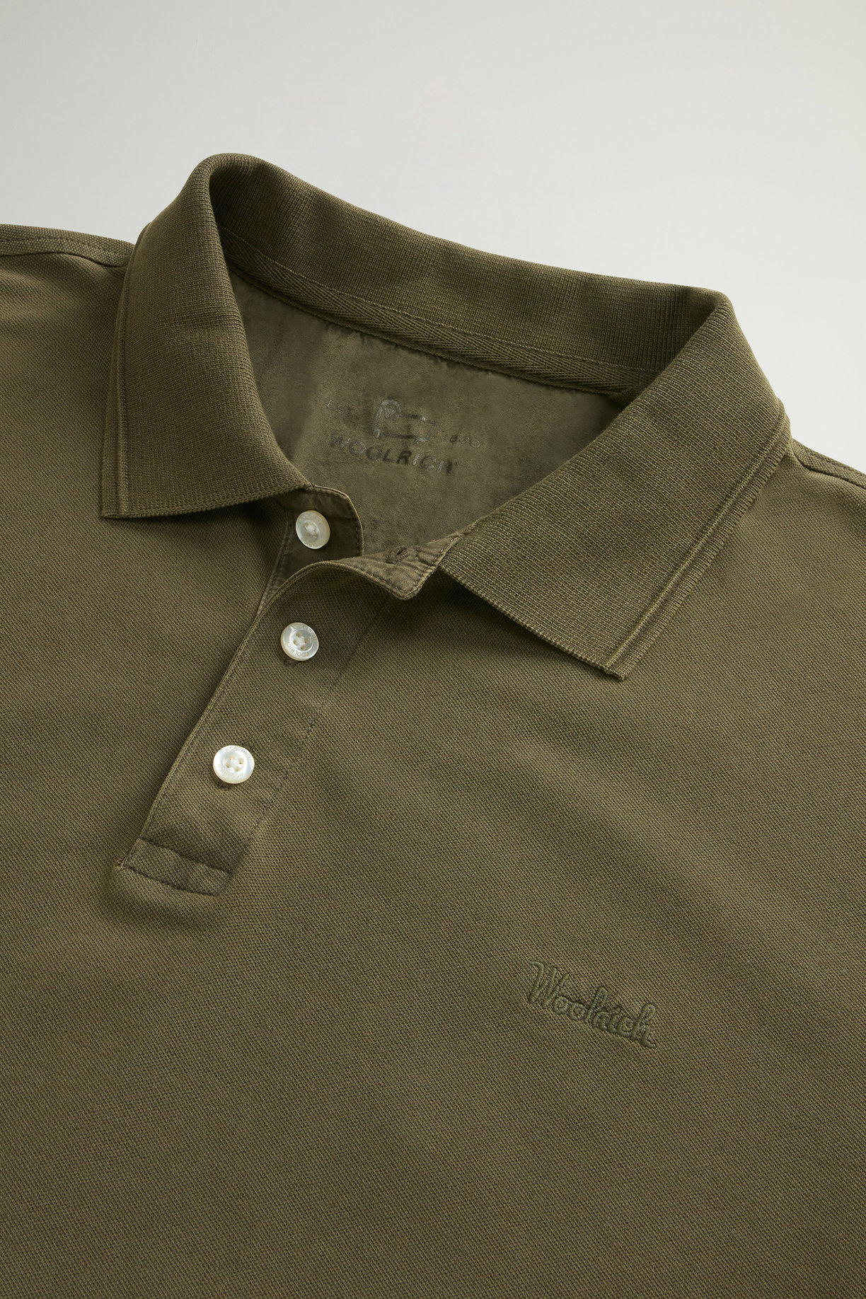 Polo Mackinack tinta in capo in piqué di cotone elasticizzato CFWOPO0065MRUT1483 6006 WOOLRICH Greenstone 