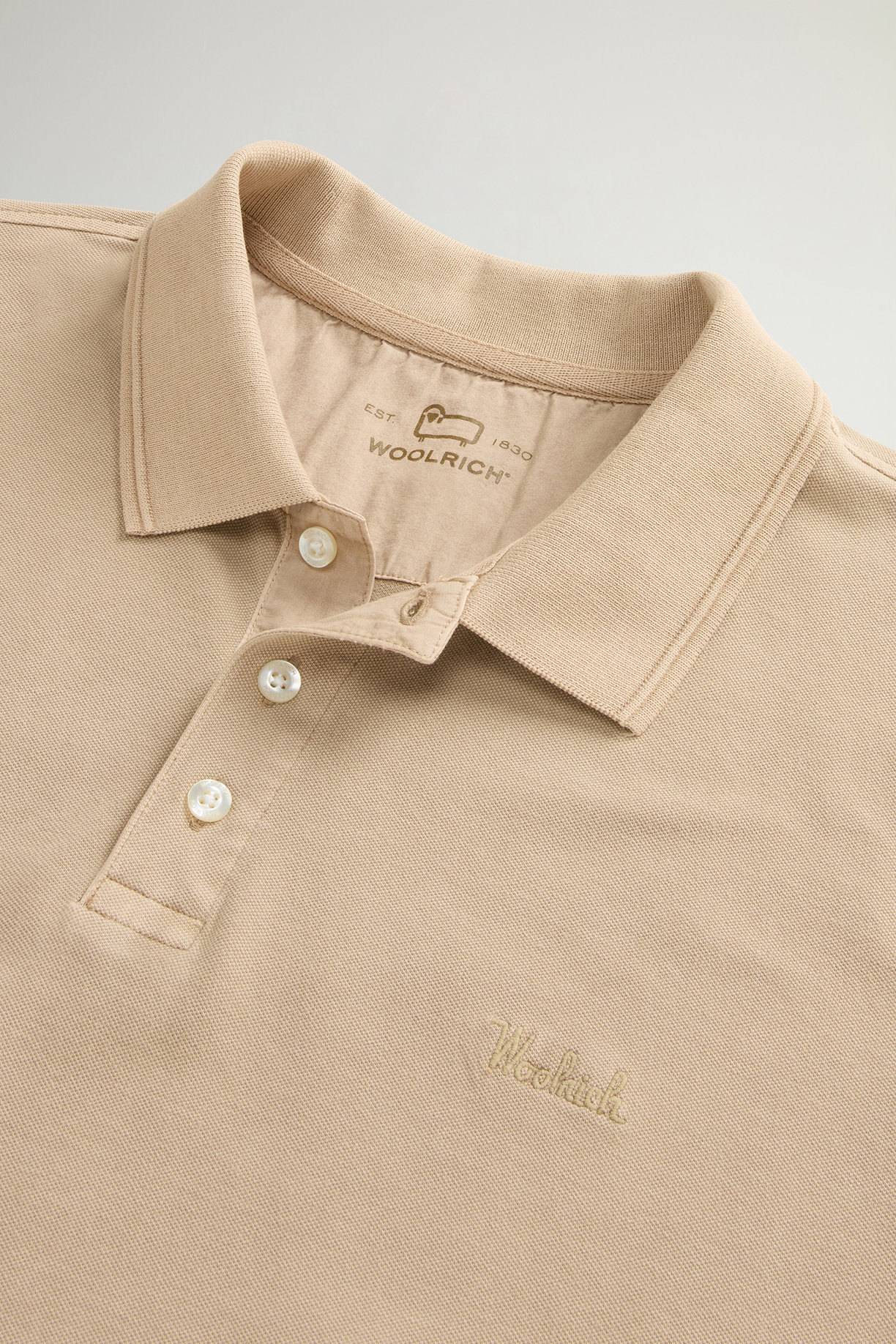 Polo Mackinack tinta in capo in piqué di cotone elasticizzato CFWOPO0065MRUT1483 8640 WOOLRICH White pepper 