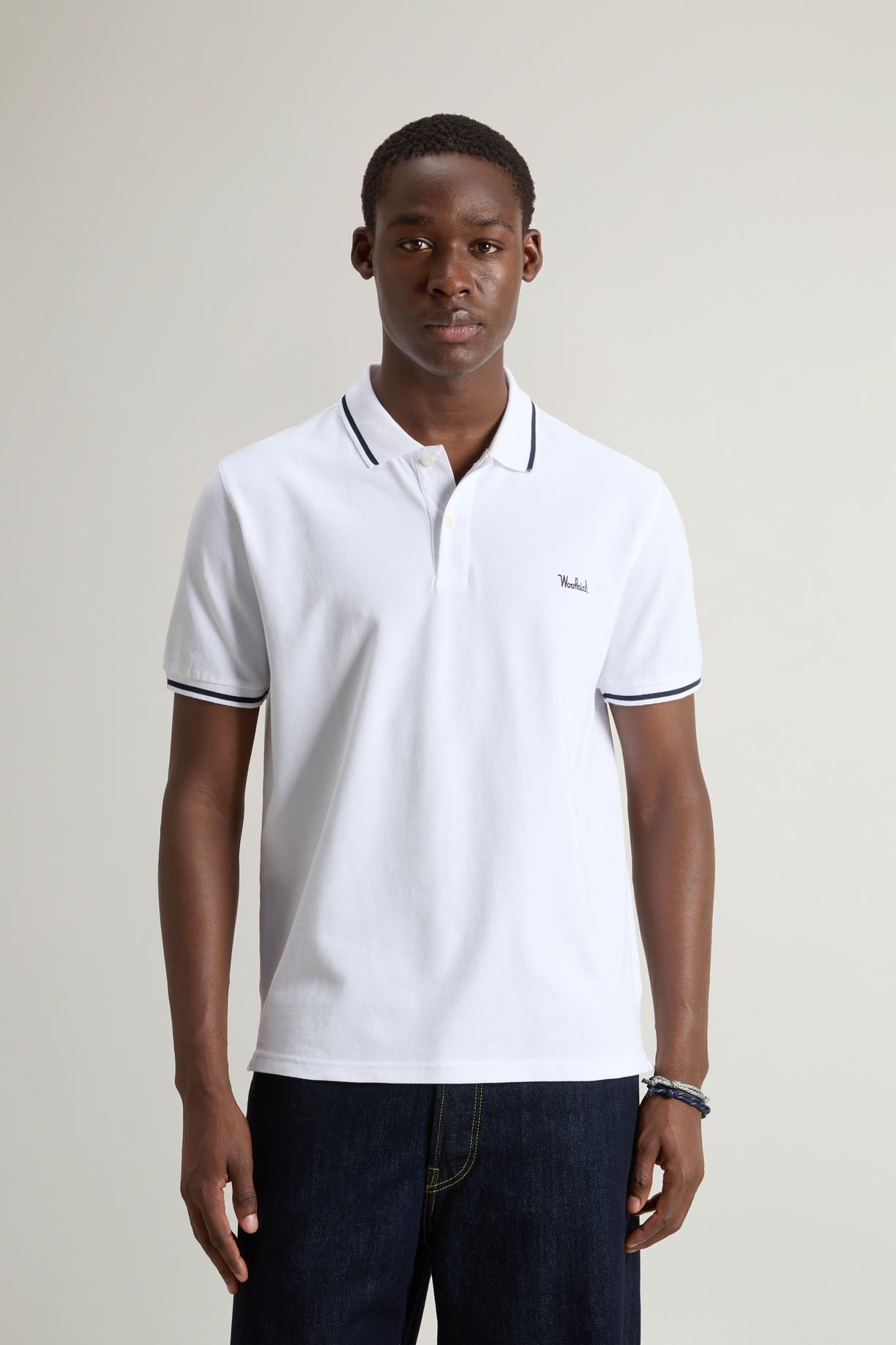 Polo Monterey in piquet di cotone elasticizzato con bordi a righe CFWOPO0066MRUT2556 8041 WOOLRICH Bright white 