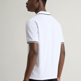 Polo Monterey in piquet di cotone elasticizzato con bordi a righe CFWOPO0066MRUT2556 8041 WOOLRICH Bright white 