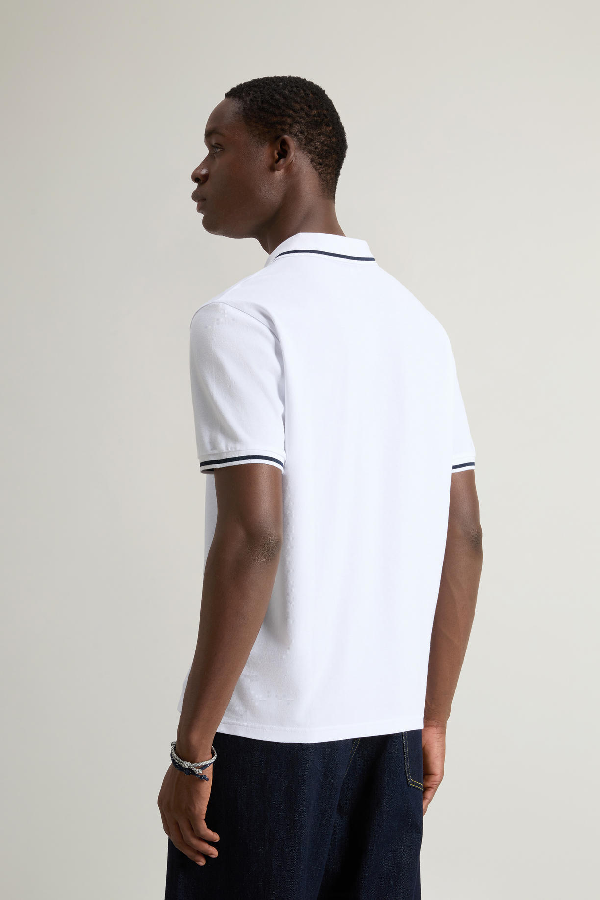 Polo Monterey in piquet di cotone elasticizzato con bordi a righe CFWOPO0066MRUT2556 8041 WOOLRICH Bright white 