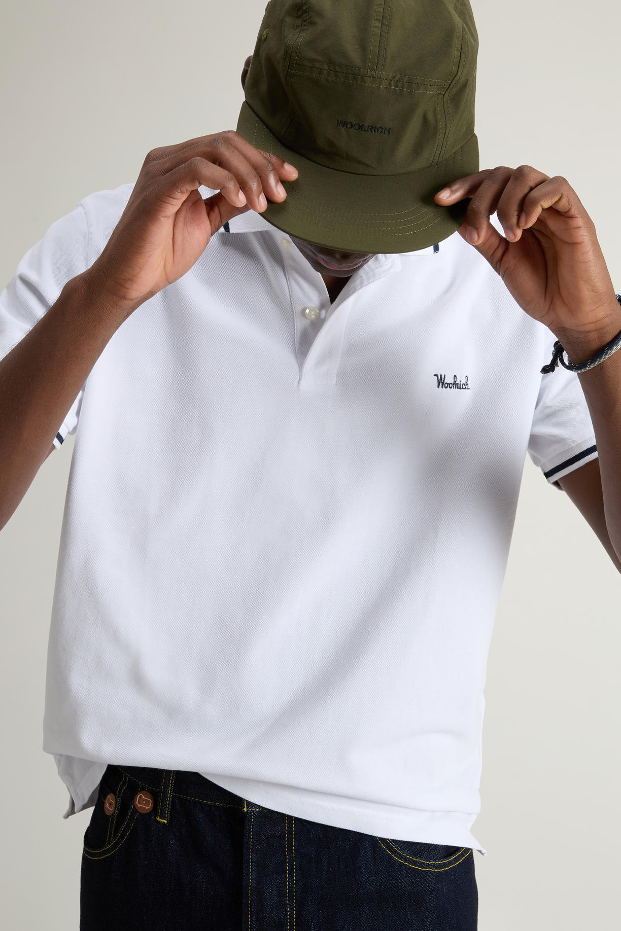 Polo Monterey in piquet di cotone elasticizzato con bordi a righe CFWOPO0066MRUT2556 8041 WOOLRICH Bright white 