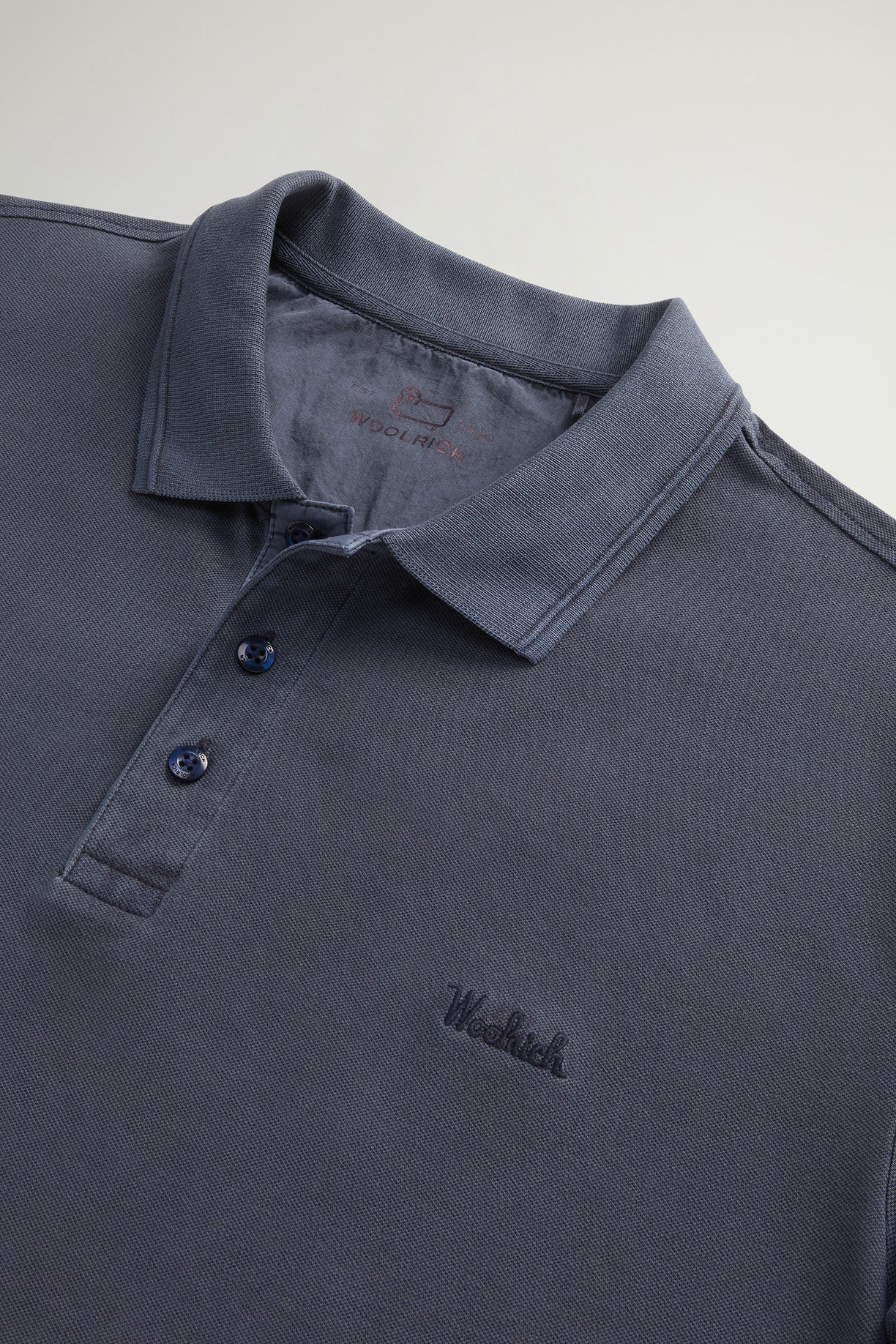 Polo Mackinack tinta in capo in piqué di cotone elasticizzato CFWOPO0065MRUT1483 3989 WOOLRICH Melton blue 