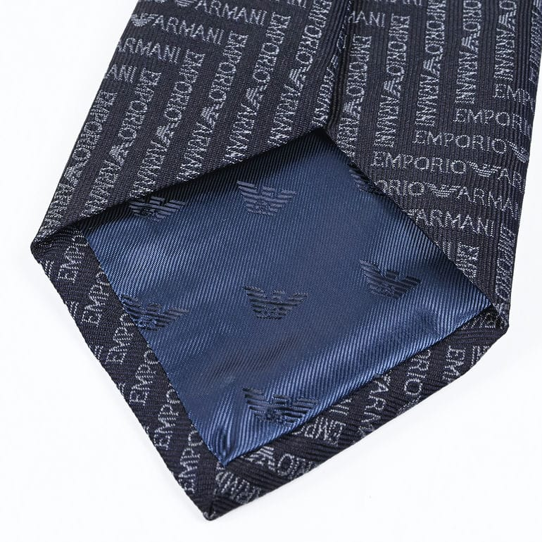 Cravatta in pura seta con lettering jacquard motivo chevron 340075 3R604 00035 EMPORIO ARMANI Blu navy 