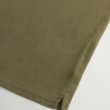 Polo Mackinack tinta in capo in piqué di cotone elasticizzato CFWOPO0065MRUT1483 6006 WOOLRICH Greenstone 