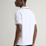 Polo Monterey in piquet di cotone elasticizzato con bordi a righe CFWOPO0066MRUT2556 8041 WOOLRICH Bright white 