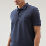 Polo Mackinack tinta in capo in piqué di cotone elasticizzato CFWOPO0065MRUT1483 3989 WOOLRICH Melton blue 