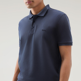 Polo Mackinack tinta in capo in piqué di cotone elasticizzato CFWOPO0065MRUT1483 3989 WOOLRICH Melton blue 