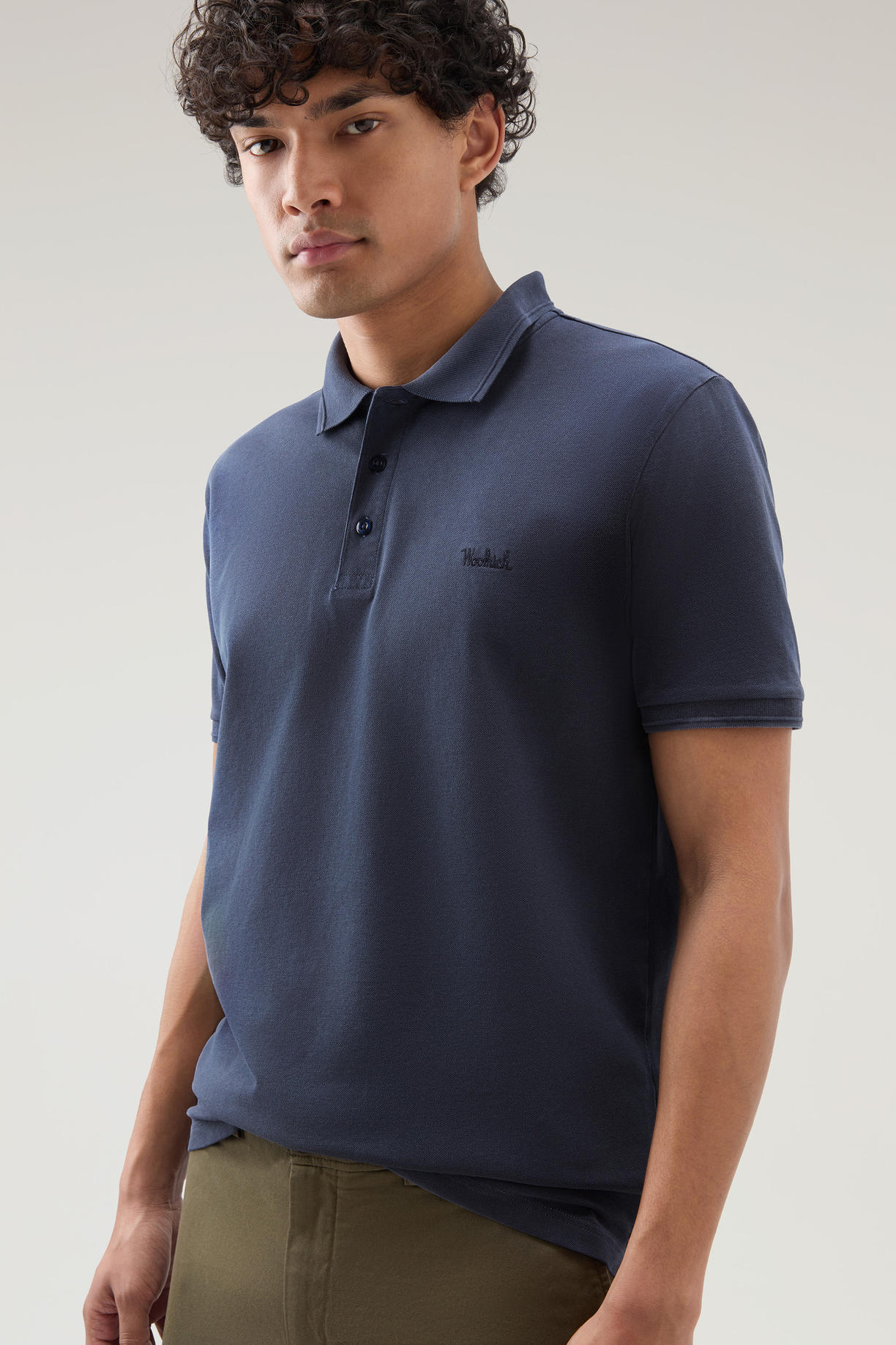 Polo Mackinack tinta in capo in piqué di cotone elasticizzato CFWOPO0065MRUT1483 3989 WOOLRICH Melton blue 